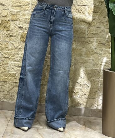 High-waisted wide-leg jeans with a stylish flipped-hem finish