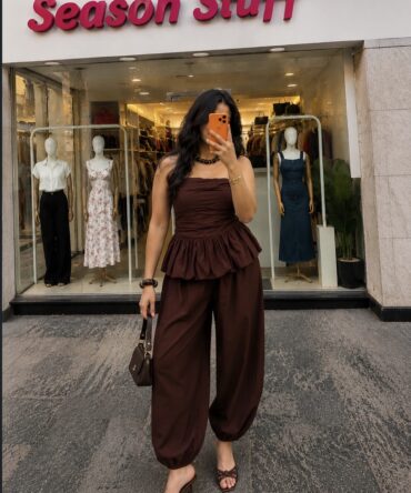 The perfect summer set with a strapless ruched top and matching pants for a chic, elevated look.