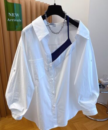 White Shirt with Navy Top 
A white button-up shirt featuring a layered navy inner top, giving a chic and effortless look. Perfect for everyday wear and casual outings.